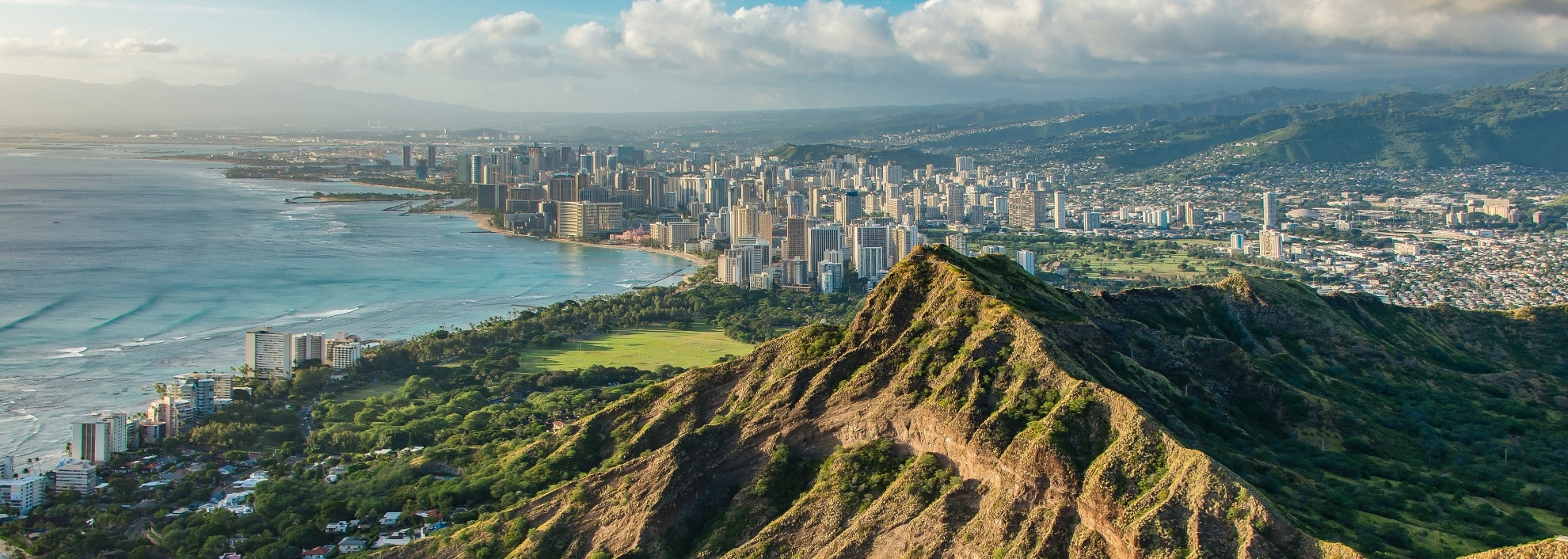 erial view of Diamond Head Crater with Honolulu cityscape